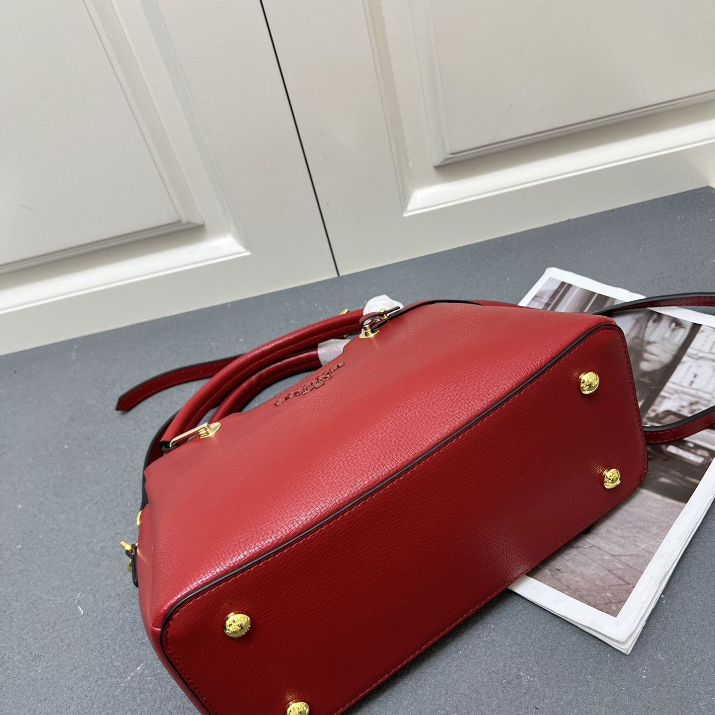 Pra*a top handle bags